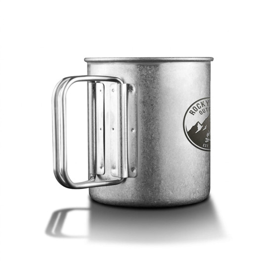 A metallic titanium cup with a sturdy handle and a branded logo, featuring a silver finish and a rugged design.
