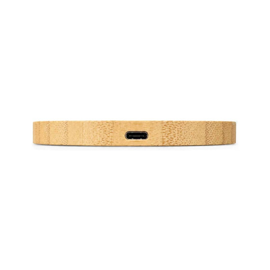 A wireless charger in a natural wood finish, featuring a USB-C port at the back.