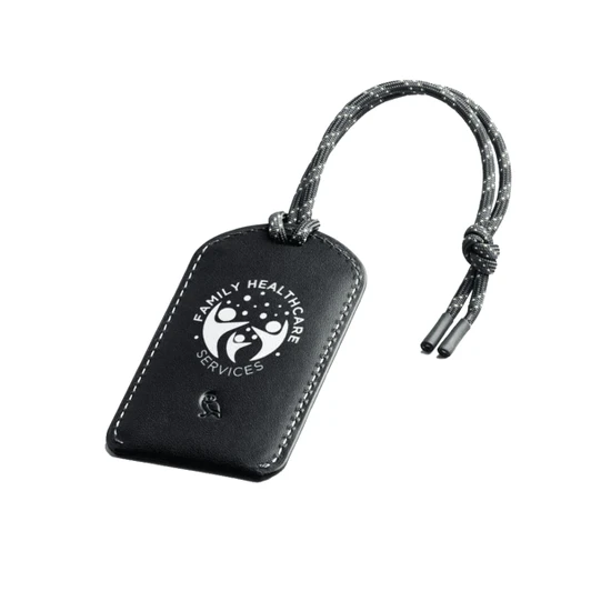 A black leather luggage tag with a grey braided cord, featuring a logo on the front.