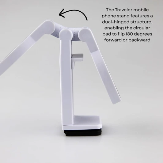 A white dual-hinged mobile phone stand with a circular pad and a flat base, designed for stability.