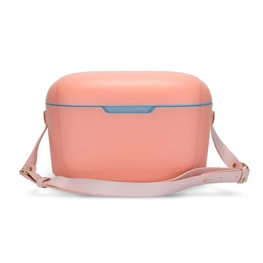 A drink cooler in soft pink with a contrasting blue latch and a detachable light pink strap.