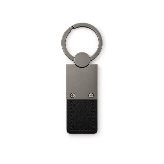 A metal keytag with a rectangular black leather strap and a circular keyring attachment.