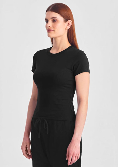 A black women's baby tee with a fitted design, displayed on a model against a plain background.