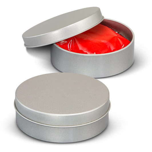A silver tin with a removable lid, containing bright red stress putty. Another empty tin is displayed beside it.
