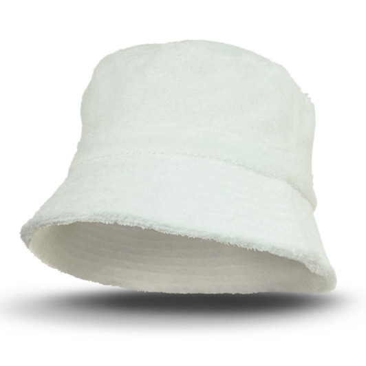 A white terry towelling bucket hat with a branded logo, featuring a wide brim and soft texture.