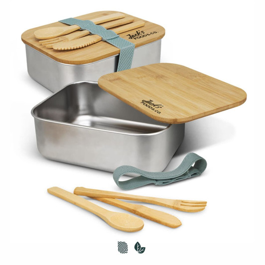 A stainless steel lunch box with bamboo lid, featuring cutlery and a green strap, showcasing a modern design.