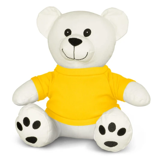 A white plush bear toy wearing a yellow shirt, featuring black paw prints and a friendly smile.