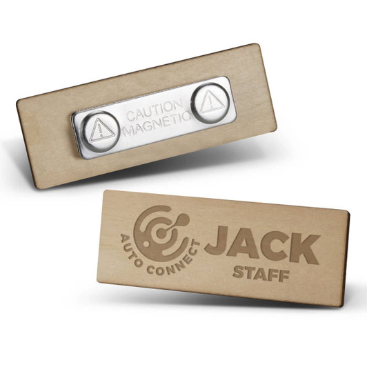 A wooden badge with a light wood finish, featuring two magnetic components and a logo.
