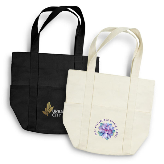 Two canvas tote bags are displayed, one black with a logo and one cream with a floral design.