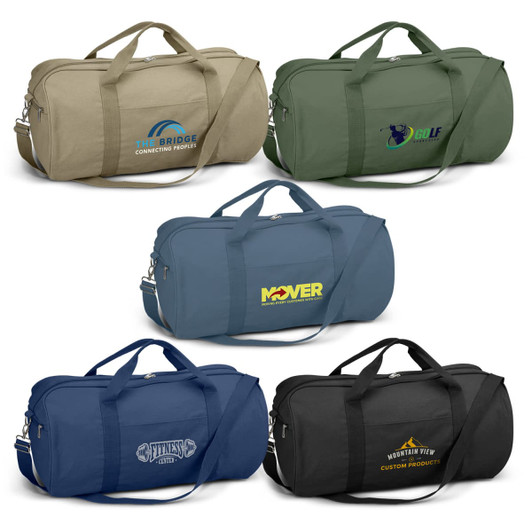 Five canvas duffle bags in various colours: olive green, dark green, navy blue, bright blue, and black, each with a logo.