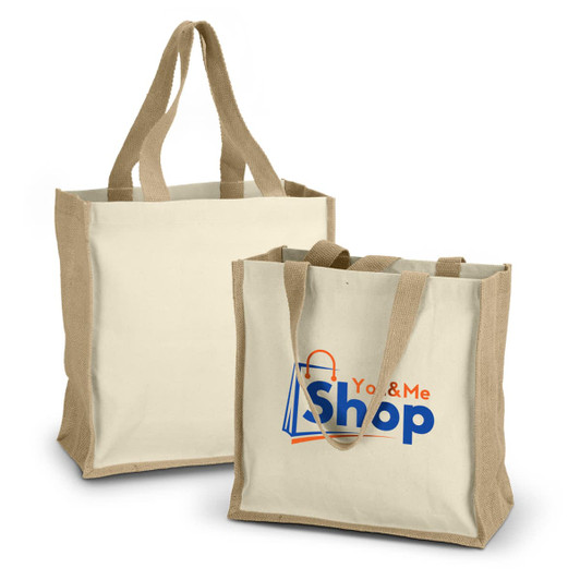 Two cream tote bags with tan handles, featuring a logo on one bag. One bag is slightly larger than the other.