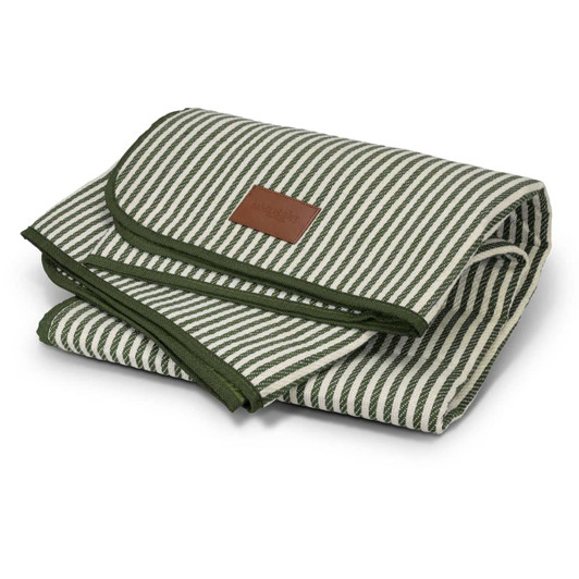 A folded picnic blanket featuring green and cream stripes, finished with a dark green trim and a small branded label.
