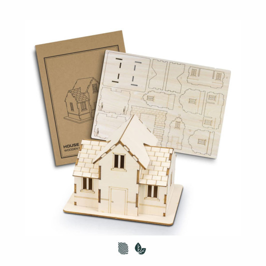 A wooden model kit of a house in natural wood colour, including a detailed layout and assembly guide.