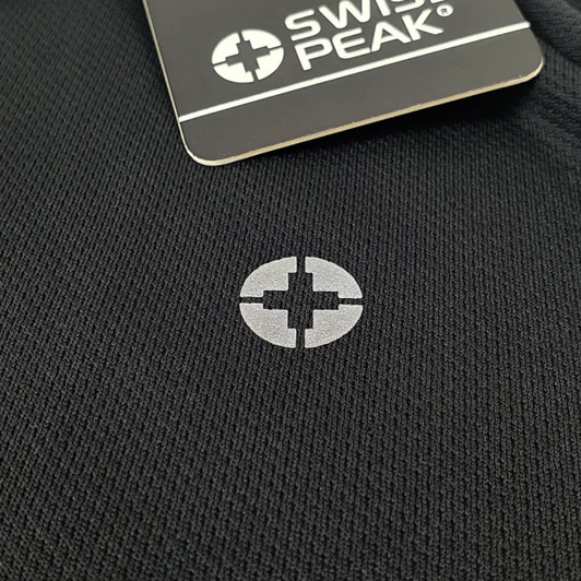 A black T-shirt featuring a small logo. Includes a tag with branding from Swiss Peak.
