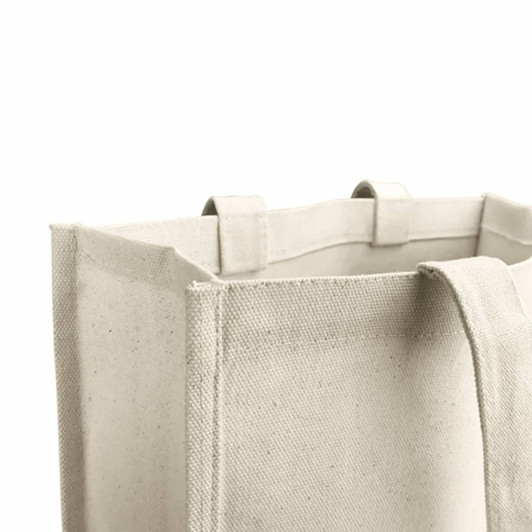 A cream-coloured canvas tote bag with sturdy handles and an open top, featuring a logo.