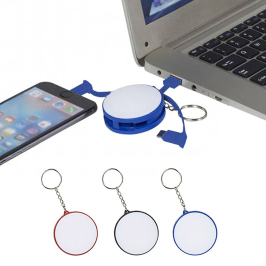 A charging cable key ring in blue, red, and black, connecting a phone to a laptop with a keychain attachment.