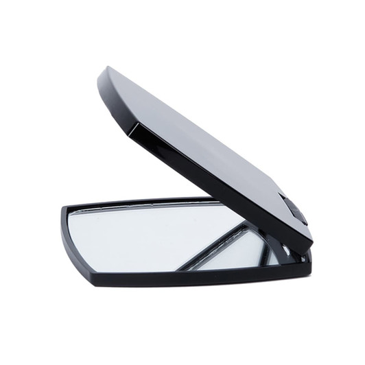 A black compact mirror with a sleek design, featuring a reflective surface inside and a logo on the exterior.