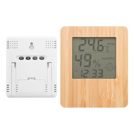 A bamboo desk clock with a digital display showing temperature, humidity, and time. The back is white with buttons.