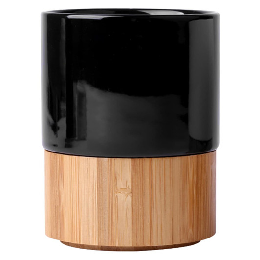 A black ceramic mug with a bamboo base, featuring a glossy finish and simple design.