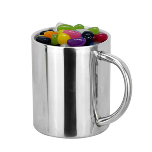 A silver mug filled with colourful jelly beans. The mug has a simple handle and a polished finish.