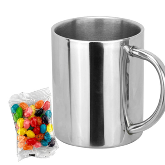 A silver coffee mug with a handle, accompanied by a bag of colourful jelly beans. The mug features a logo.