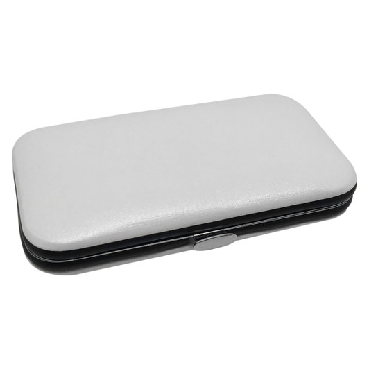 A white and black manicure set case with a sleek design, featuring a logo on the surface.
