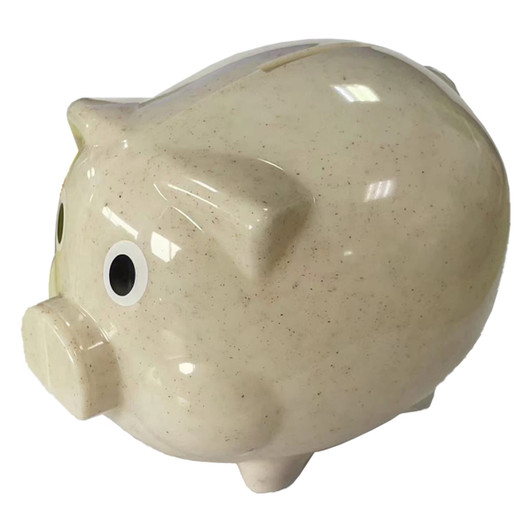 A beige piggy bank made from wheat straw with large eyes and a slot for coins, featuring a smooth finish.