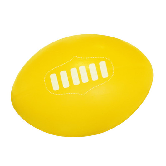 A yellow stress football with a white logo design on the surface.