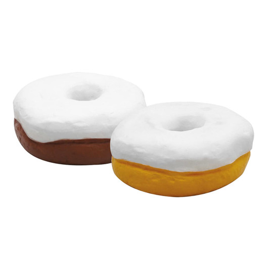 A pair of stress donut toys, featuring a yellow and a brown donut with white icing, made from soft material.