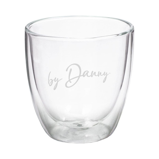 A double wall glass featuring a clear design with a subtle branding logo. Holds 340ml of liquid.