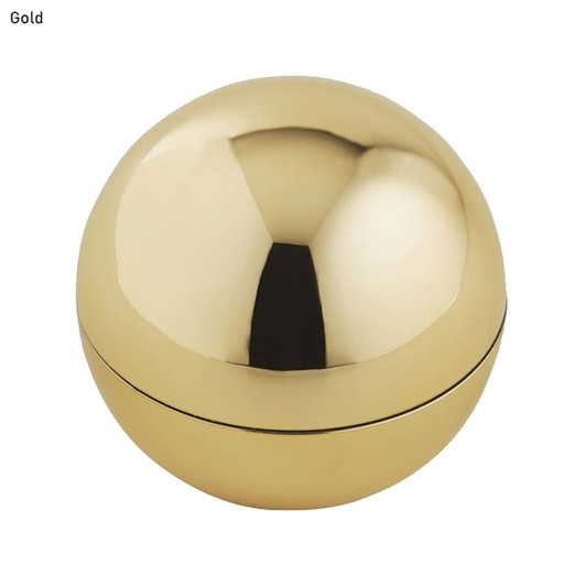 A round, gold lip balm container with a smooth, reflective surface and a seam.