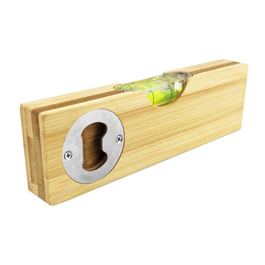 A drink bottle opener leveller in bamboo with a stainless steel opening and a built-in spirit level.