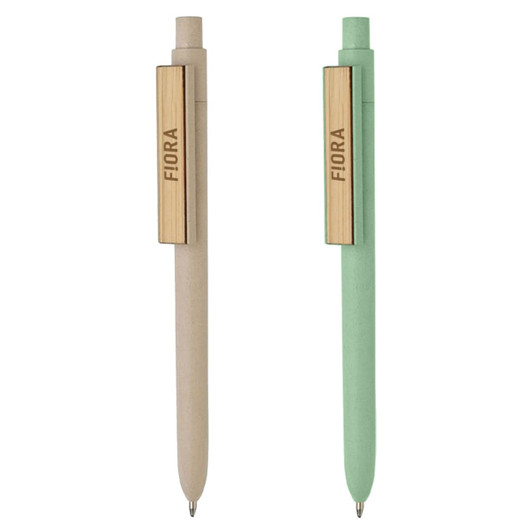 Two bamboo fiber pens in beige and green, featuring a wooden clip and branding element.