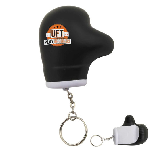 A black stress glove key ring shaped like a boxing glove, featuring a logo, attached to a keychain.