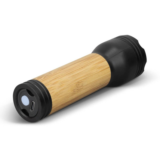 A rechargeable bamboo torch with a black end cap and USB charging port, featuring a sleek, natural bamboo body.