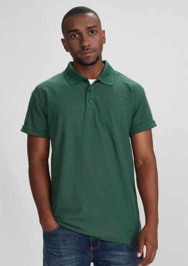 A green polo shirt with a collar and rolled sleeves on a model, featuring a logo.