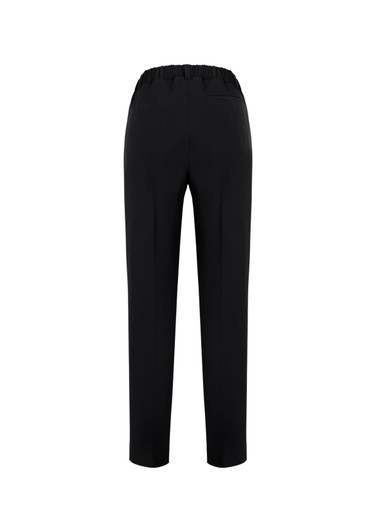 A pair of women's black bandless pants with an elastic waist and a sleek design from the back view.