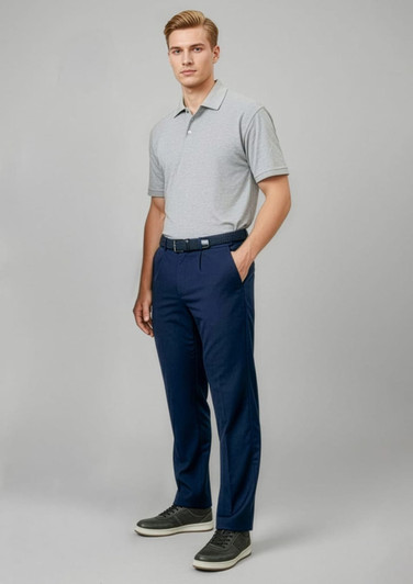 A model wearing navy slacks paired with a grey polo shirt and styled with casual shoes. The outfit features a logo.