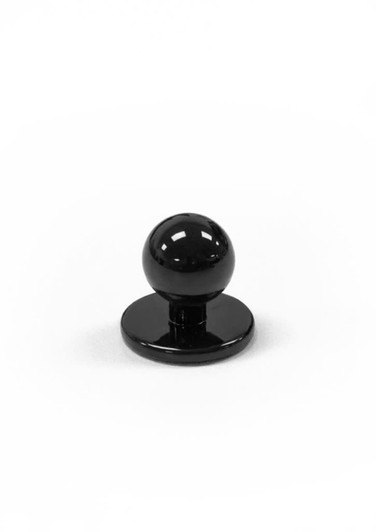 A black chef jacket button with a rounded top and a flat base. The item is shiny and simple in design.