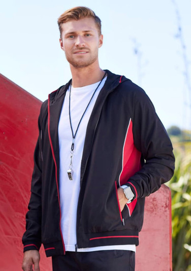 A soft shell jacket in black with red accents, featuring a hood and a logo.