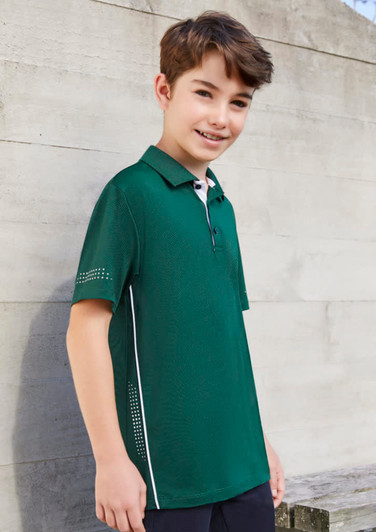 A green short sleeve polo shirt for kids featuring a collar and a logo. The design includes subtle detailing on the sleeves.