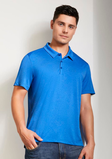 A blue short sleeve polo shirt with a collar and a logo, featured on a model against a light background.
