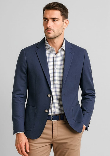 A navy blue men's blazer with a slim fit, featuring two buttons and side pockets, worn over a checked shirt.