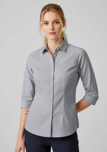 A women’s 3/4 sleeve button-up shirt in light grey with a fitted design and a collar, featuring a logo.