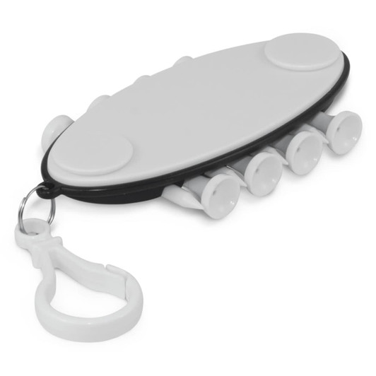 A white and black golf accessory with multiple small compartments and a clip attachment. It features a branding logo.
