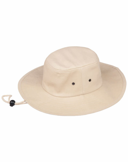 A beige bucket hat with eyelet vents and a pull cord for an adjustable fit. It features a logo on the side.