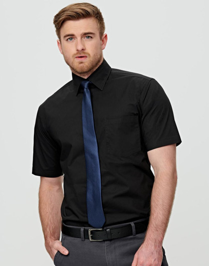 A black short-sleeve button-up shirt featuring a pocket and worn with a navy tie. The shirt has a logo.