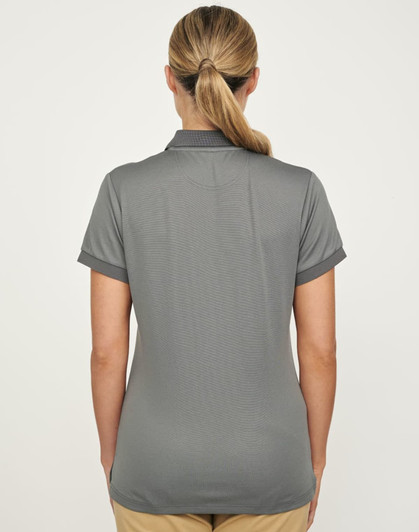 A grey women's polo shirt made from sustainable poly/cotton, featuring a collar and short sleeves.
