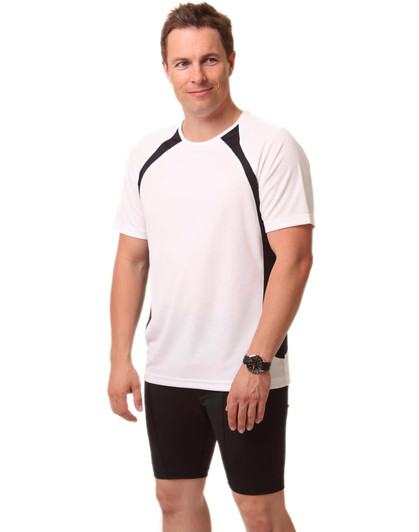 A white men's T-shirt with black side panels and a logo, modelled by a person, paired with black shorts.