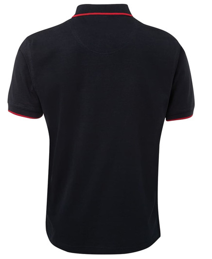 A navy polo shirt with a red trim and a logo on the front. The shirt features a classic collar and short sleeves.